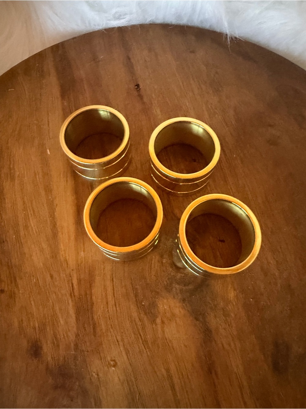 vintage brass napkin rings with ribbed detailing.